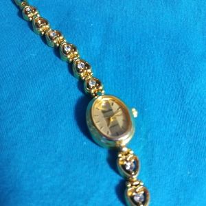 Watch with heart links and zircons, United 7"